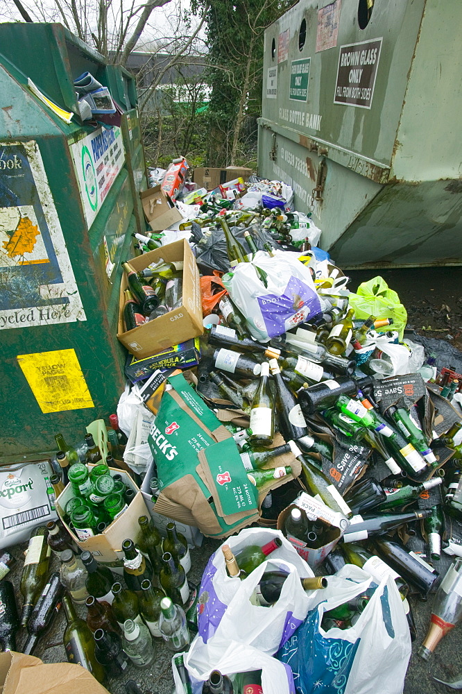 A bottle bank overflowing after Christmas in Ambleside, Cumbria, England, United Kingdom, Europe