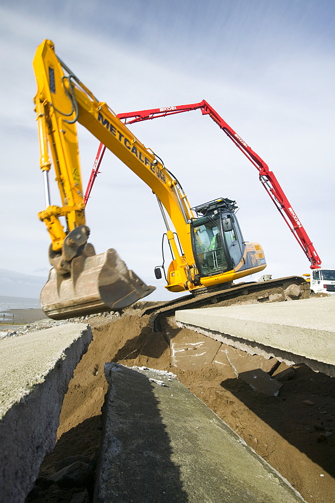 Repairing damage to the road between Allonby and Silloth caused by floods in 2008, Cumbria, England, United Kingdom, Europe