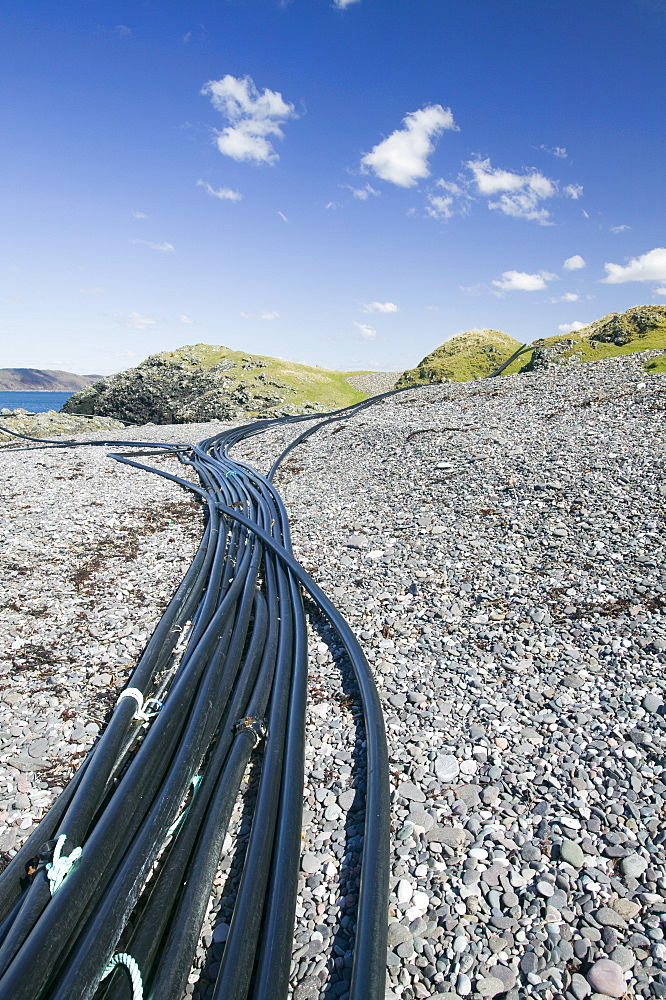 Plastic pipes dumped on a beach near Oban, Scotland, United Kingdom, Europe