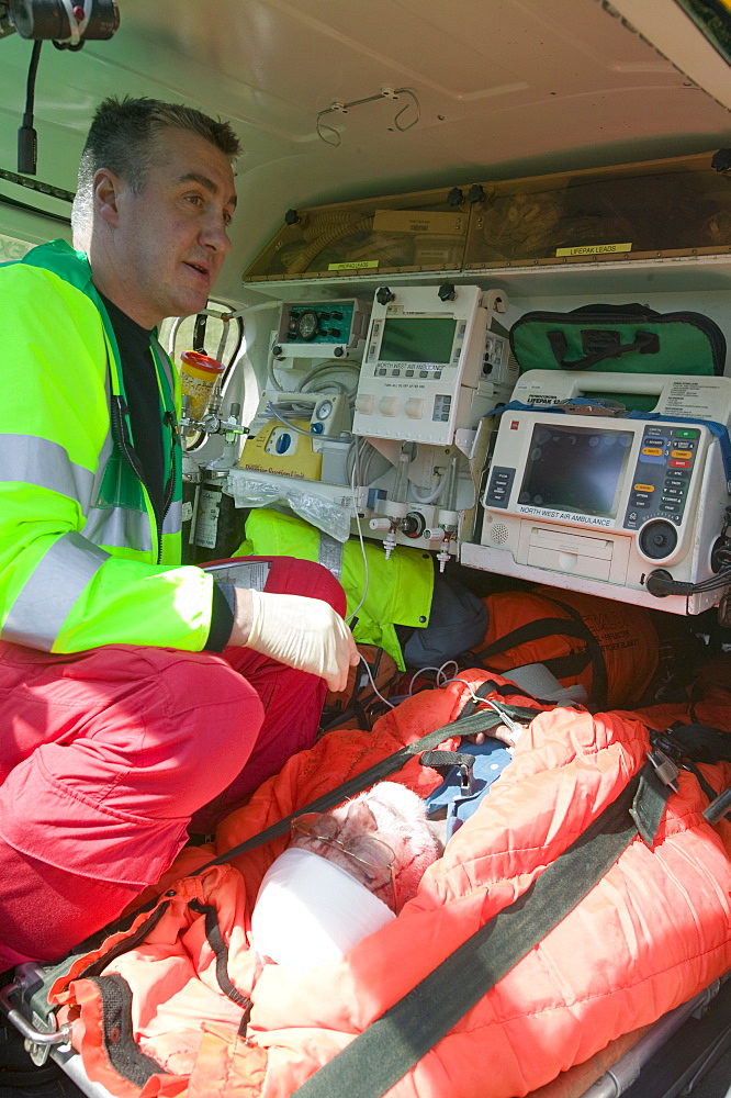 An air ambulance attends a mountain rescue on Wansfell in the Lake District, Cumbria, England, United Kingdom, Europe