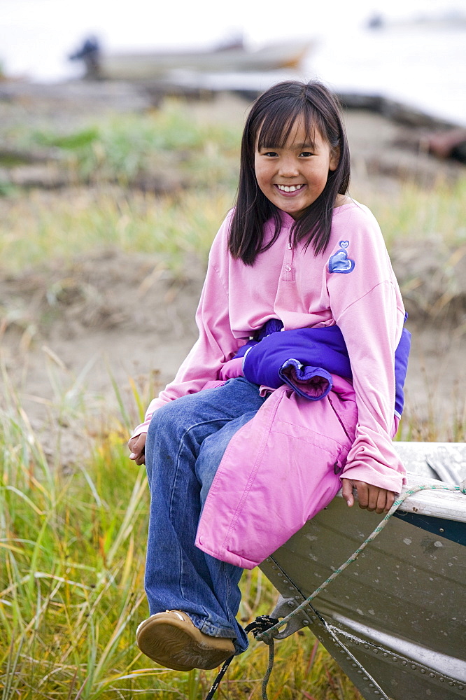 An Inuit girl on Shishmaref, a tiny island between Alaska and Siberia in the Chukchi Sea, United States of America, North America