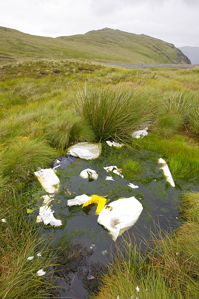 Farmers rubbish left in a bog on Helvellyn, Lake District National Park, Cumbria, England, United Kingdom, Europe