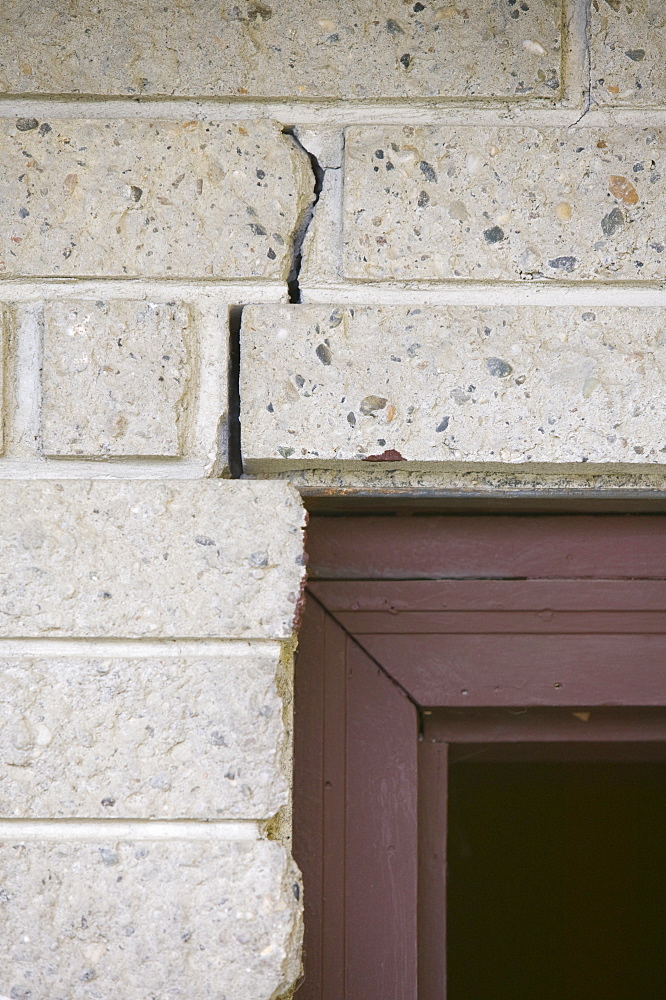 Detail of cracks in a house collapsing due to global warming-induced permafrost melt, Fairbanks, Alaska, United States of America, North America