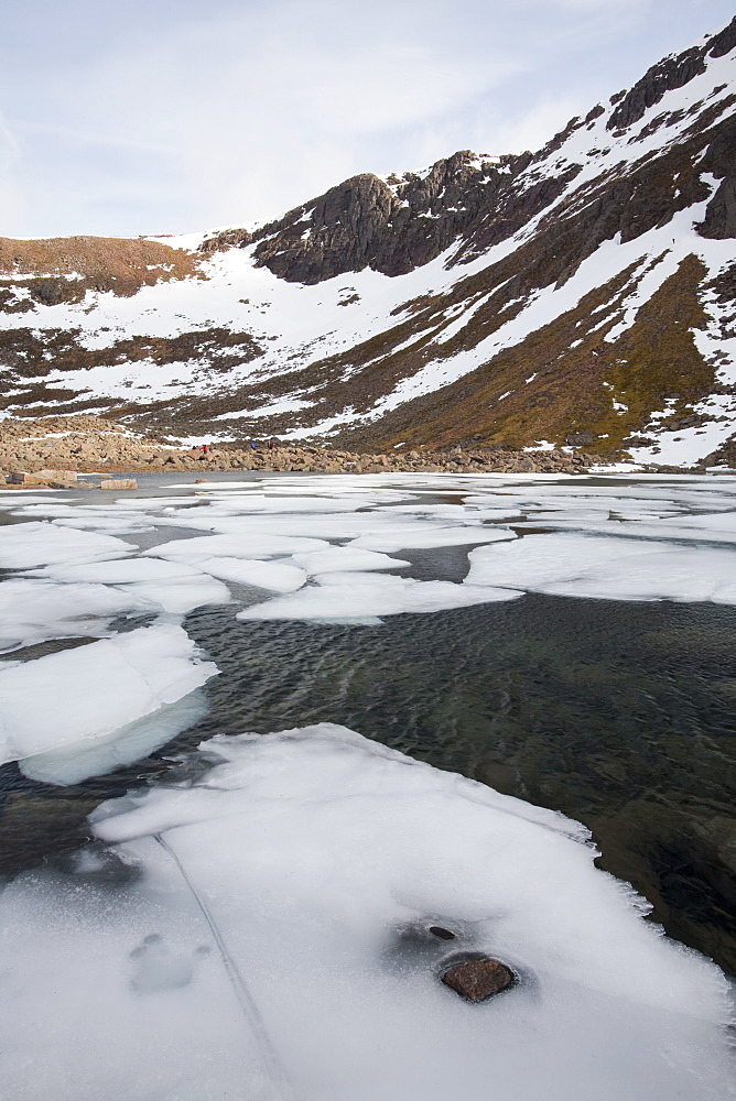 A frozen lochan in Corrie an Lochain in the Cairngorm mountains, Scotland, United Kingdom, Europe