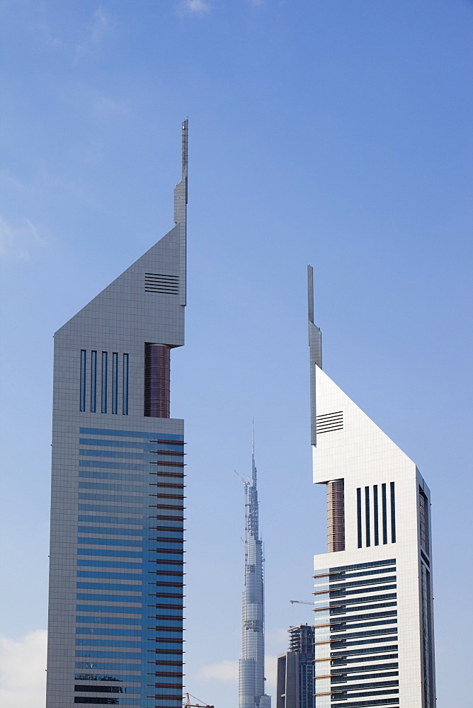 The Burj Dubai, the worlds tallest building seen through the Emirates Towers in Dubai, United Arab Emirates, Middle East