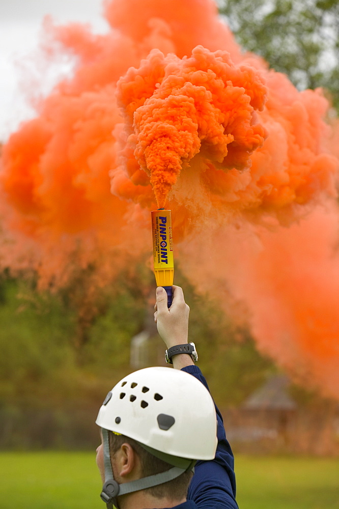 Emergency flare to attract incoming Sea King Helicopter, Lake District, Cumbria, England, United Kingdom, Europe