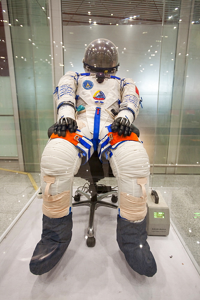 Chinese astronaut's suits on display in Beijing airport, China, Asia