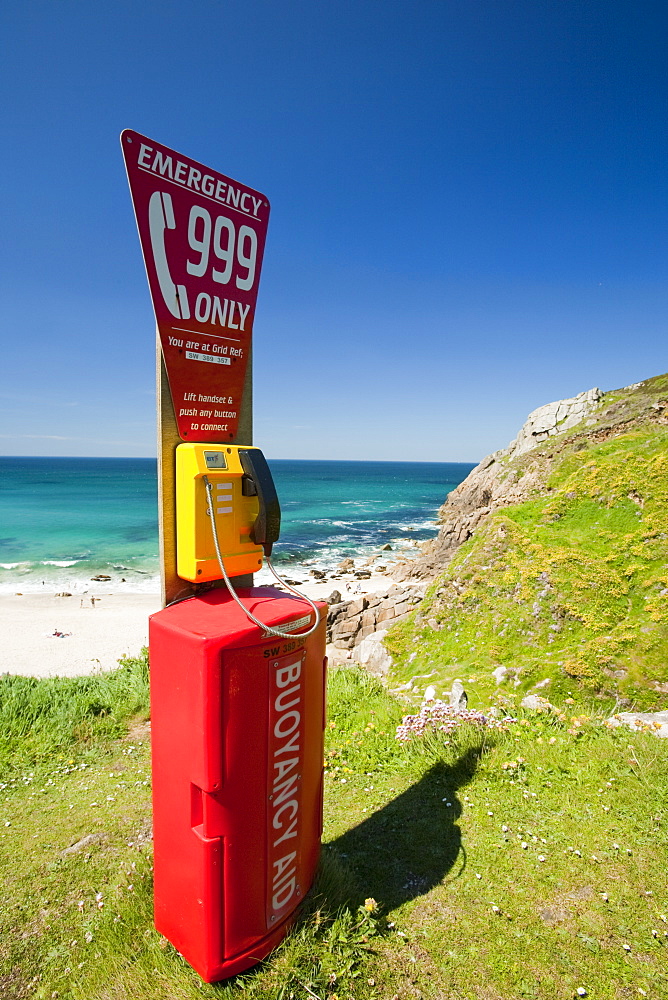 An emergency phone above Portheras Cove near St. Just, Cornwall, England, United Kingdom, Europe