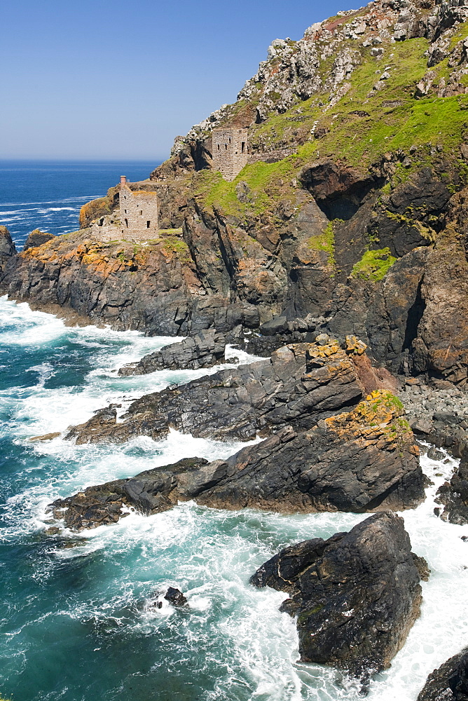 The famous Crown tin mine at Bottallack on the North Cornish coast, now abandoned but its old shafts extend way out below the sea, Cornwall, England, United Kingdom, Europe