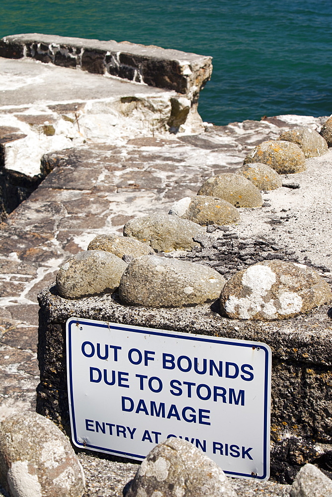 Harbour wall damaged by a severe storm at Lamorna Cove in Cornwall, England, United Kingdom, Europe