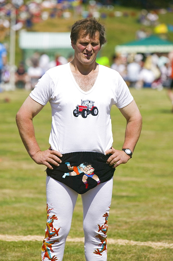 A Cumberland wrestler wearing traditional costume at Ambleside Sports, Lake District, Cumbria, England, United Kingdom, Europe