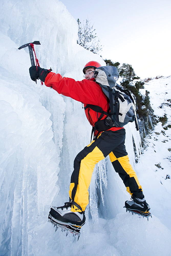 The mountaineer, Mike Withers, ice climbing in Fisher Place gill above Thilrmere in the Lake District, Cumbria, England, United Kingdom, Europe