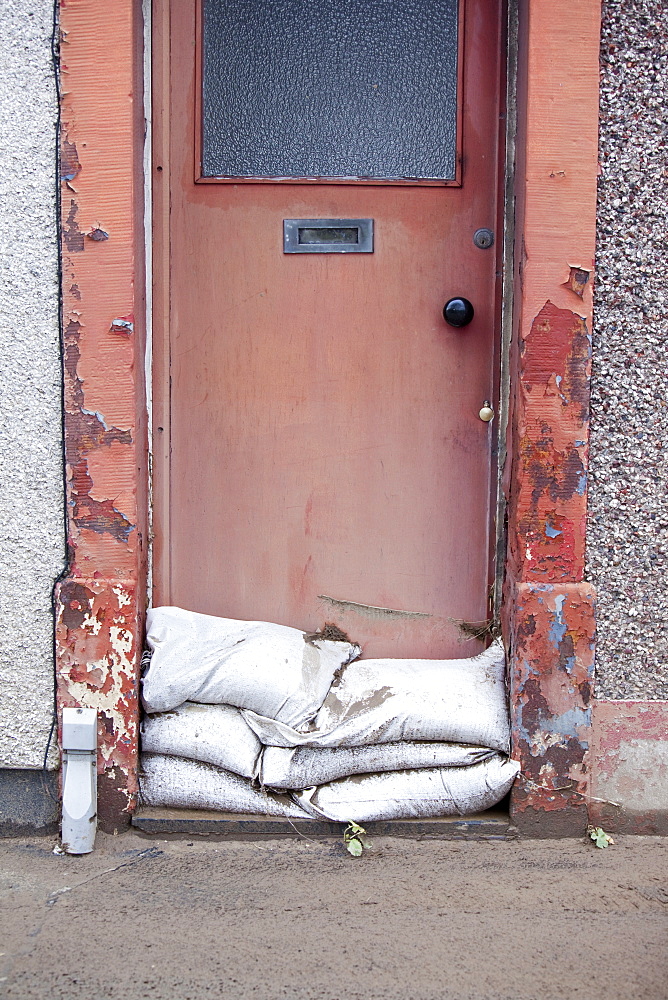 A house door in Workington that was inundated by floodwater, Cumbria, England, United Kingdom, Europe