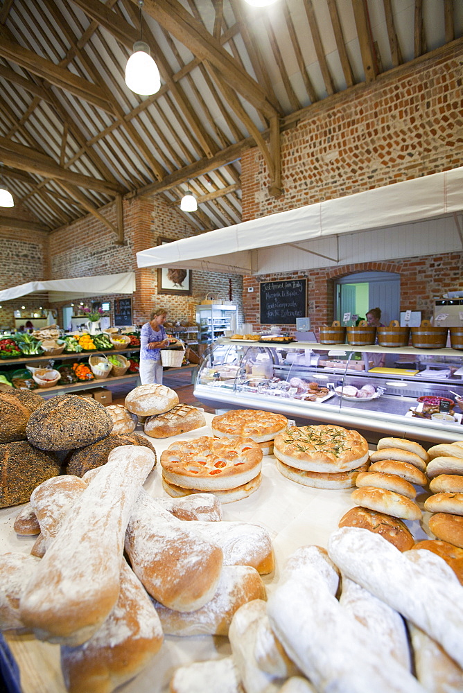 Home grown produce for sale at a farm shop in an old barn on a farm near Holt, Norfolk, England, United Kingdom, Europe