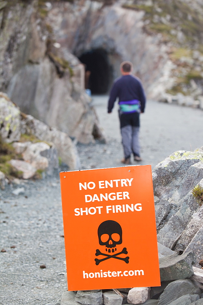 No entry, danger signs at the entrance to Honister Slate Mine, Lake District, Cumbria, England, United Kingdom, Europe