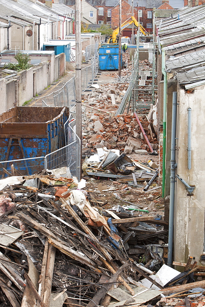 Timber being separated out for recycling at condemned houses being demolished in Barrow in Furness, Cumbria, England, United Kingdom, Europe