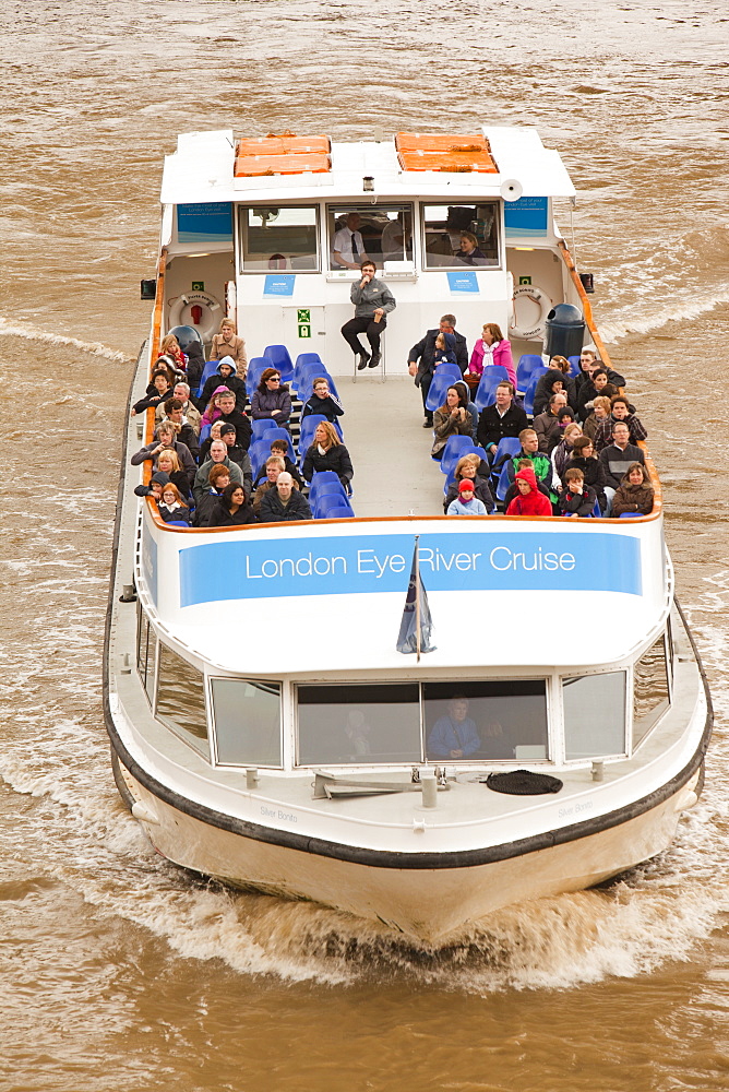 A tourist boat trip on the River Thames in London, England, United Kingdom, Europe