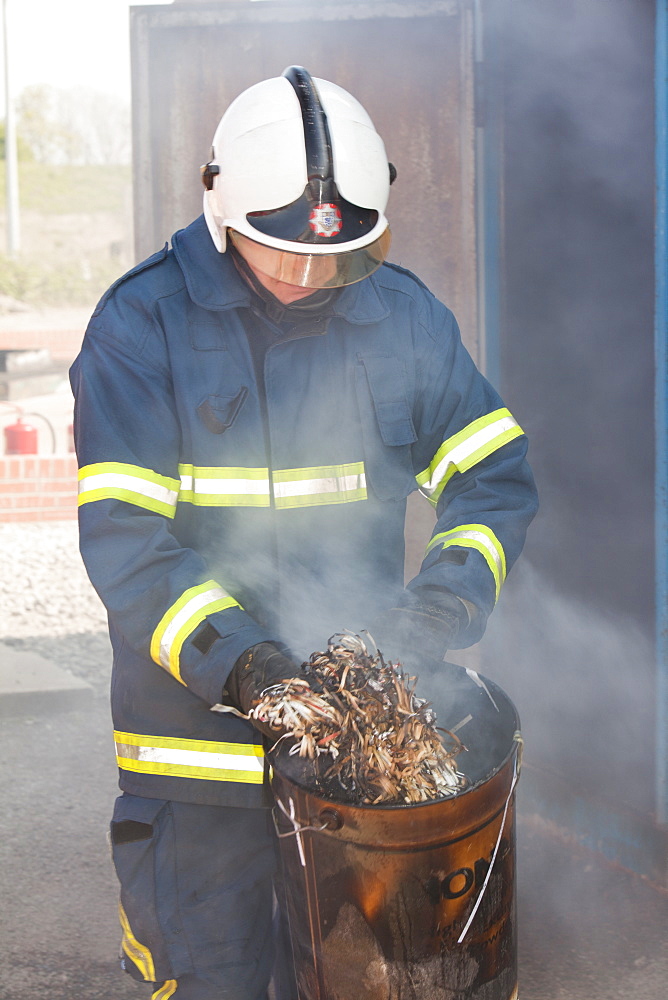 A fire fighting exercise as part of a BOSIET course for offshore workers, Billingham, Teesside, England, United Kingdom, Europe