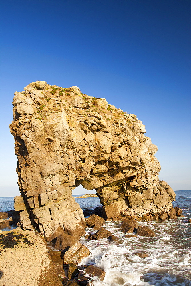 Sea stacks and sea arch on the North East coast at Whitburn, between Newcastle and Sunderland, Tyne and Wear, England, United Kingdom, Europe