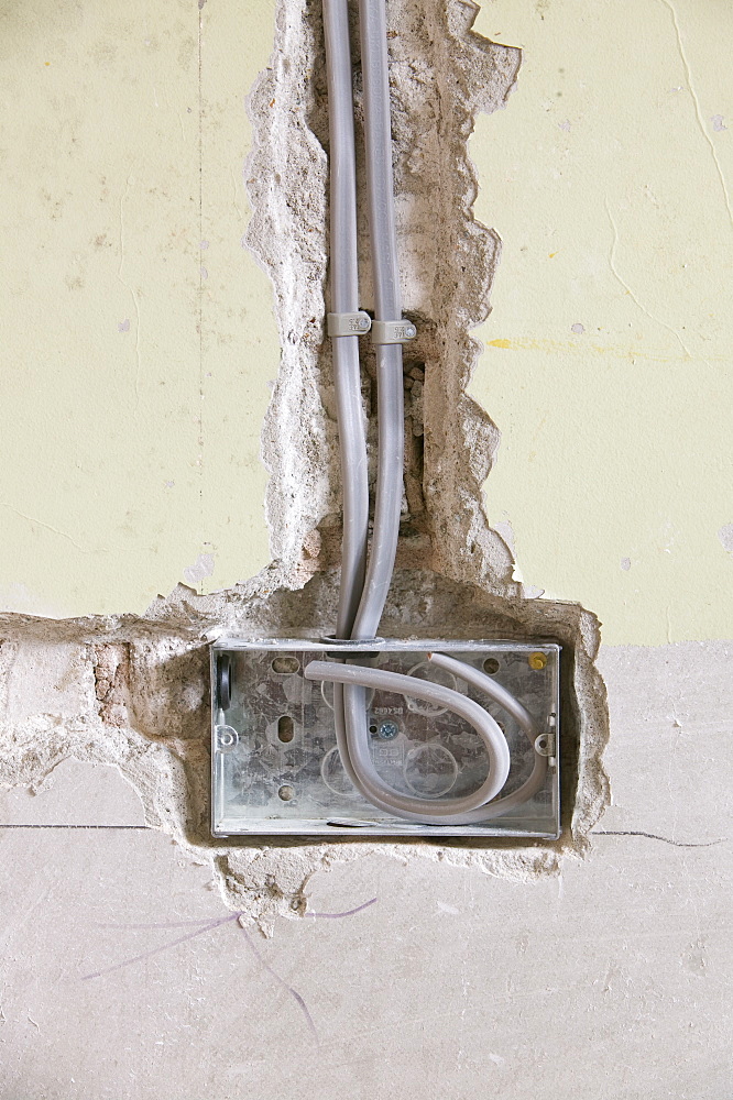 Wiring a plug socket into a house wall, United Kingdom, Europe