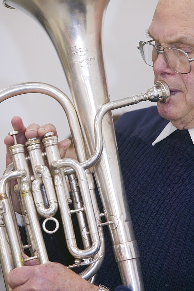 A Salvation Army member playing in the band, United Kingdom, Europe