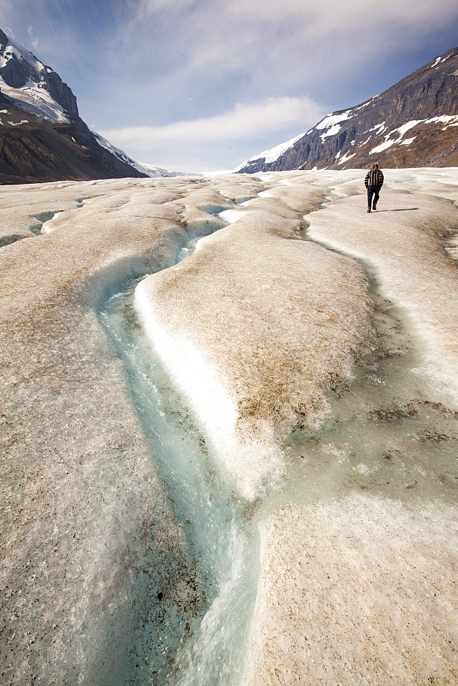 Meltwater channels and tourists on the Athabasca Glacier, Jasper National Park, UNESCO World Heritage Site, Alberta, Canadian Rockies, Canada, North America