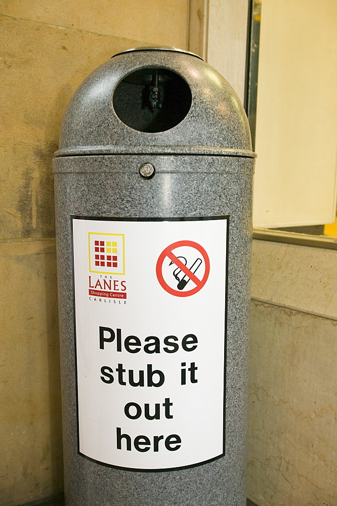 A bin for fag ends in a shopping centre in Carlisle, Cumbria, England, United Kingdom, Europe