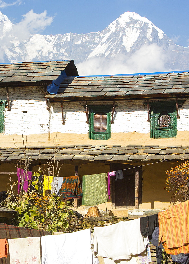 Ghandruk village with Annapurna South rising beyond, Nepalese Himalayas, Nepal, Asia