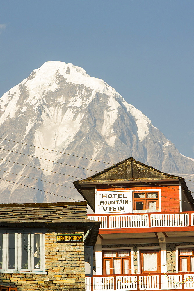 A tea house lodge in the Himalayas, looking towards Annapurna South, Nepal, Asia