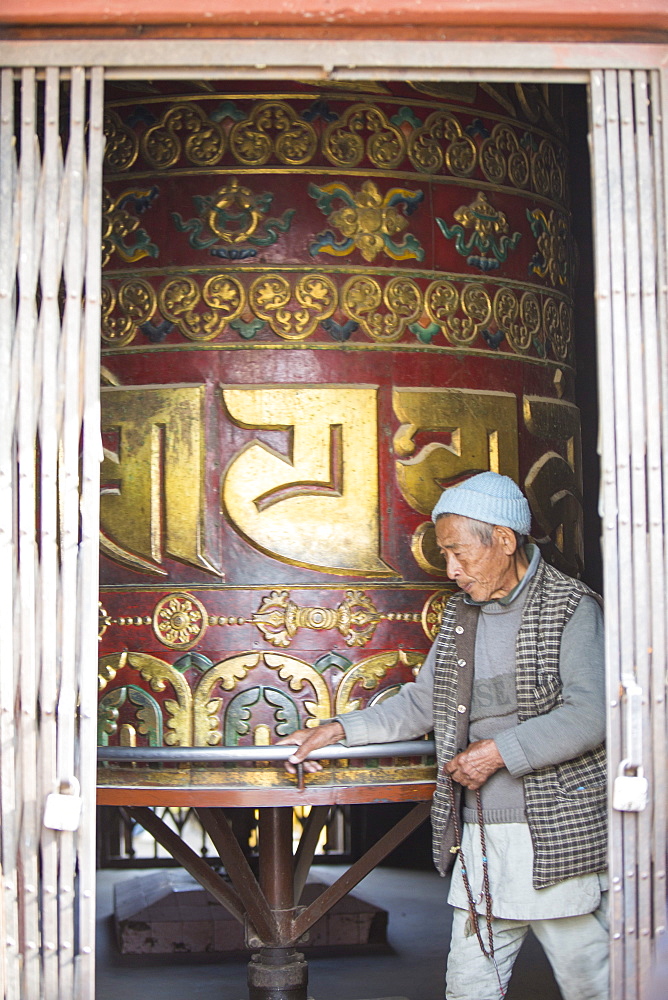 Prayer wheel at the Boudhanath Stupa, one of the holiest Buddhist sites in Kathmandu, Nepal, Asia