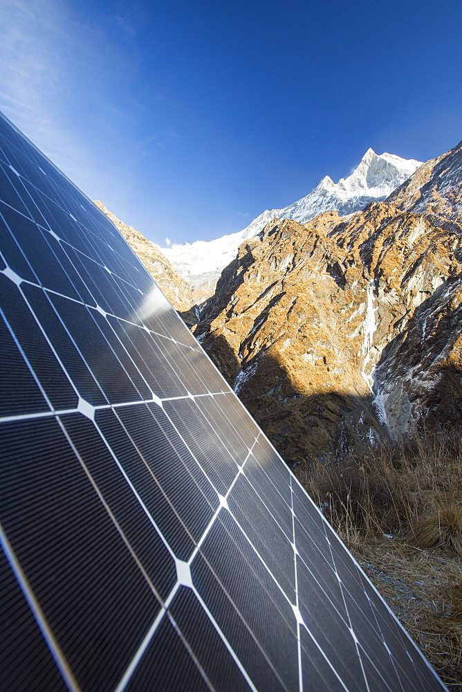 An automated weather station being powered by solar panels at Machapuchare Base Camp, Himalayas, Nepal, Asia