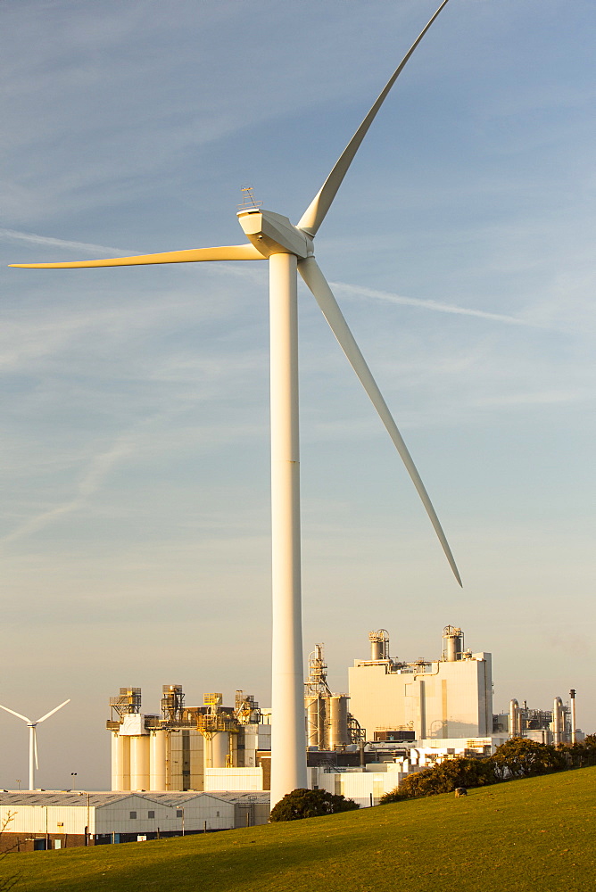 A 2 MW wind turbine producing renewable electricity in the grounds of the Eastman factory on the outskirts of Workington, Cumbria, England, United Kingdom, Europe