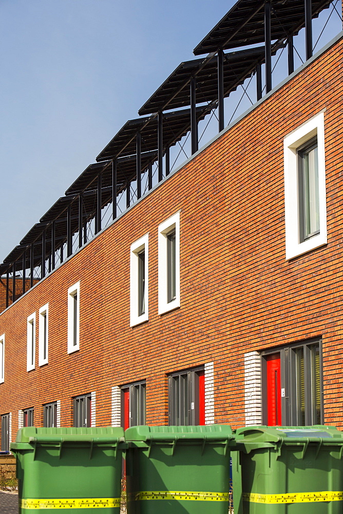 Houses in Almere with solar PV panels on the roof, Flevoland, Netherlands, Europe