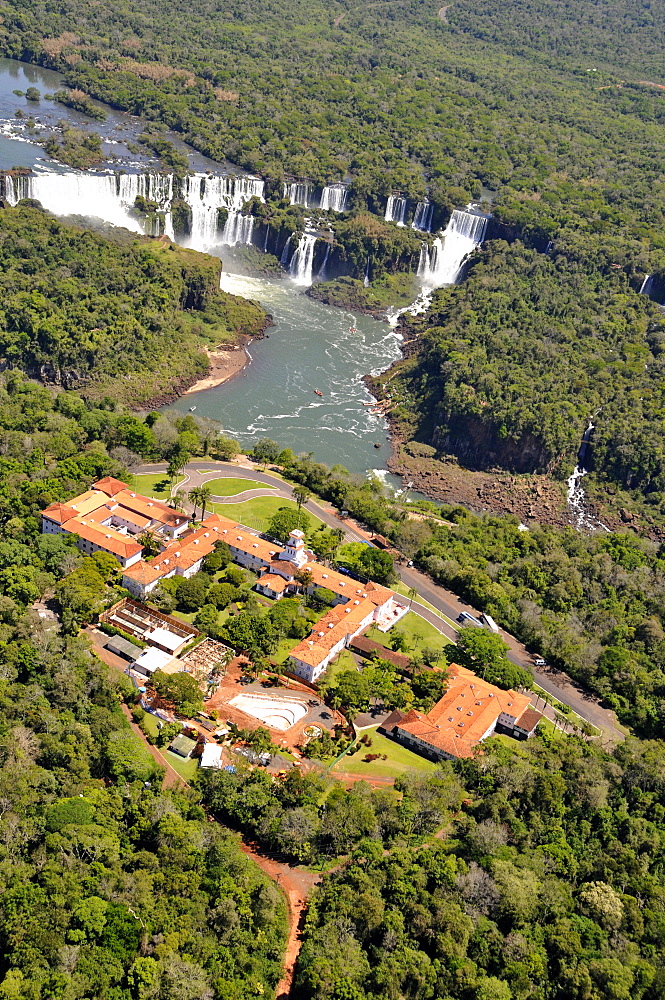 Aerial view of Iguassu Falls,UNESCO World Heritage Site, including  Hotel das Cataratas on Brazilian side and falls on Argentinian side, South America