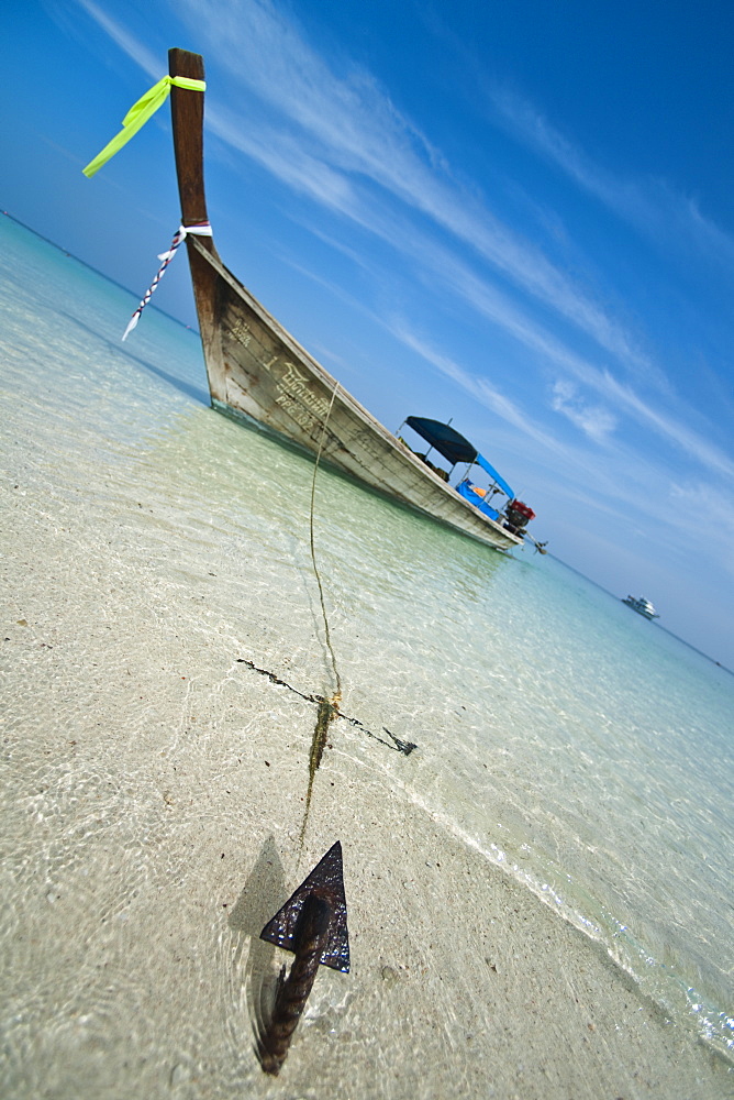 Traditional Thai Long Tail Boat on beach.  Krabi, Thailand, South-East Asia, Asia