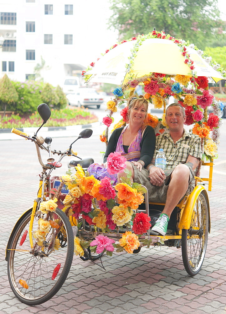 rickshaw.  Christ Church, Malacca, Malaysia, Asia