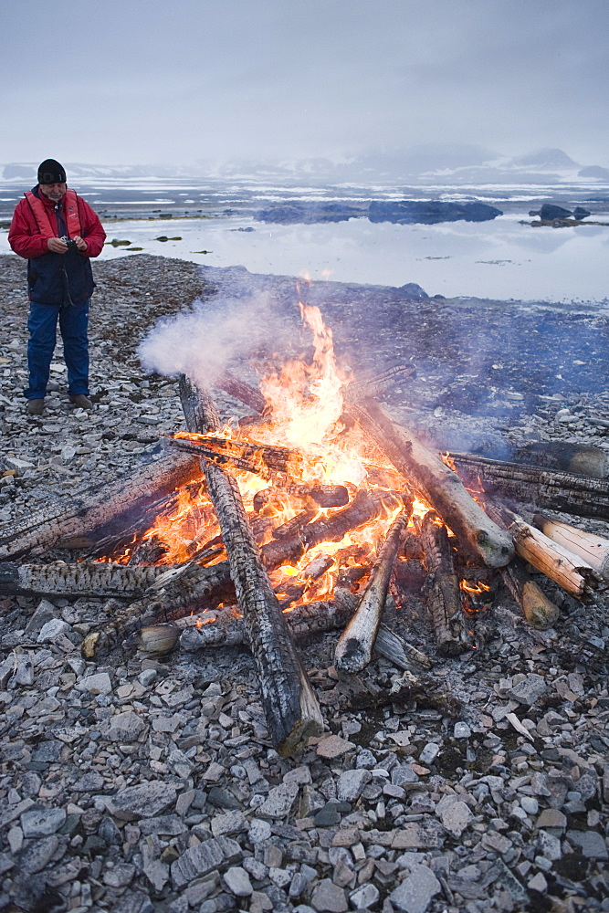 Bonfire on the beach. Svalbard, Norway