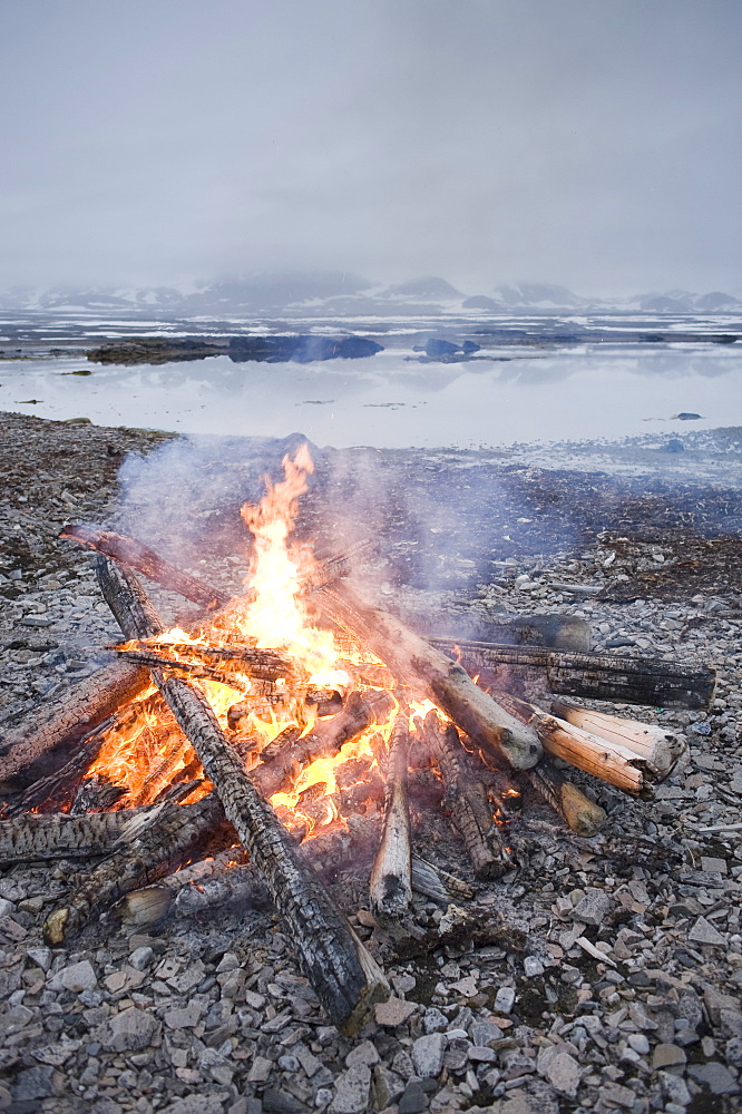 Bonfire on the beach. Svalbard, Norway