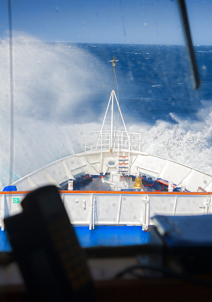 07/04/2009. Major sea swells and storms cause 4 -5 meter waves on board the Clipper Adventurer. Port hole room view. La Orotava, North Atlantic Ocean, Tenerife Island. Canary Islands