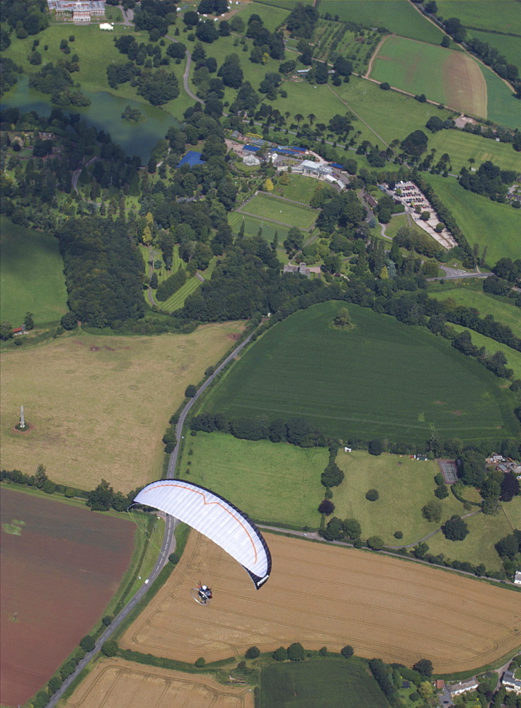 aerial views  of Paramotoring over the countryside in Devon UK