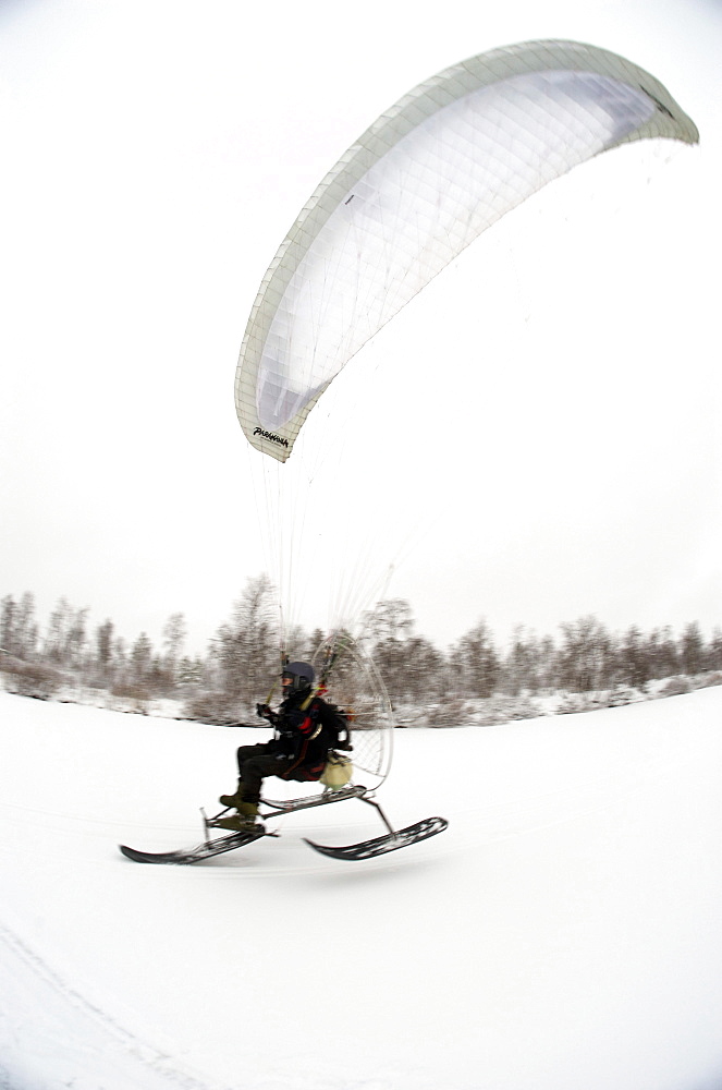 Olof Heikka a sami reindeer herdsman  on his paramotor