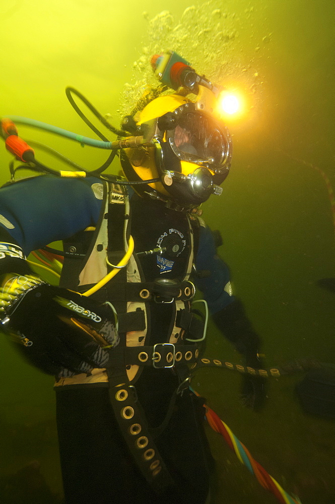 Commercial diver working underwater, Fort William, Scotland, United Kingdom, Europe