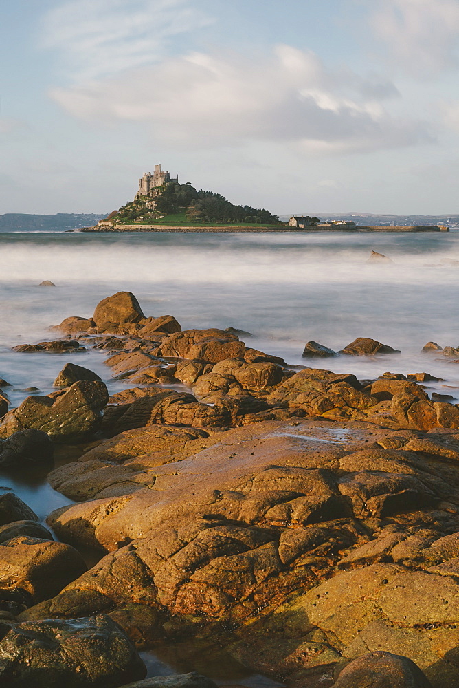 Rocky shoreline and St. Michaels Mount, early morning, Cornwall, England, United Kingdom, Europe 