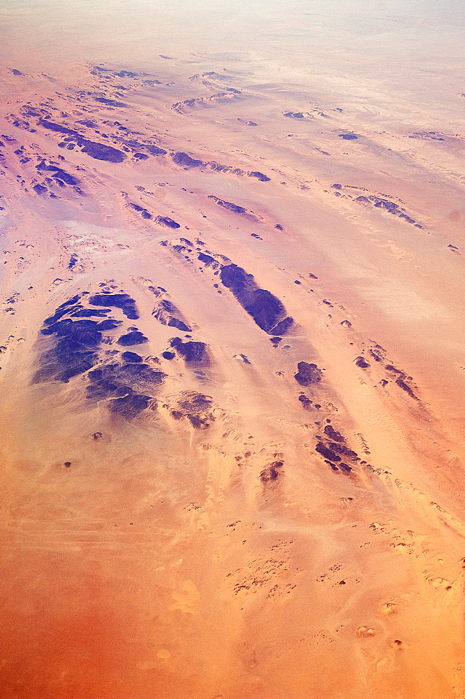 from 35,000 feet in the air, the Sahara Desert looks more like the surface of Mars. Sahara Desert, Libya, North Africa