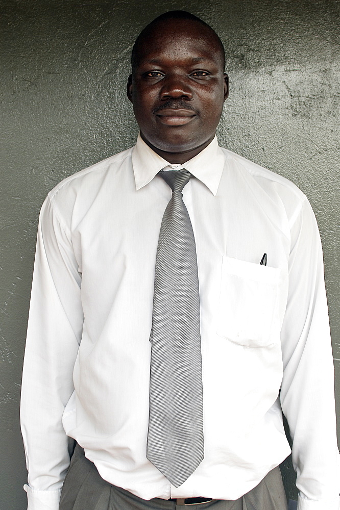 Antony, a local administrative assistant from Gulu, working for a British aid agency AFCIC- Action for Children in Conflict. Gulu Town, Uganda, East Africa