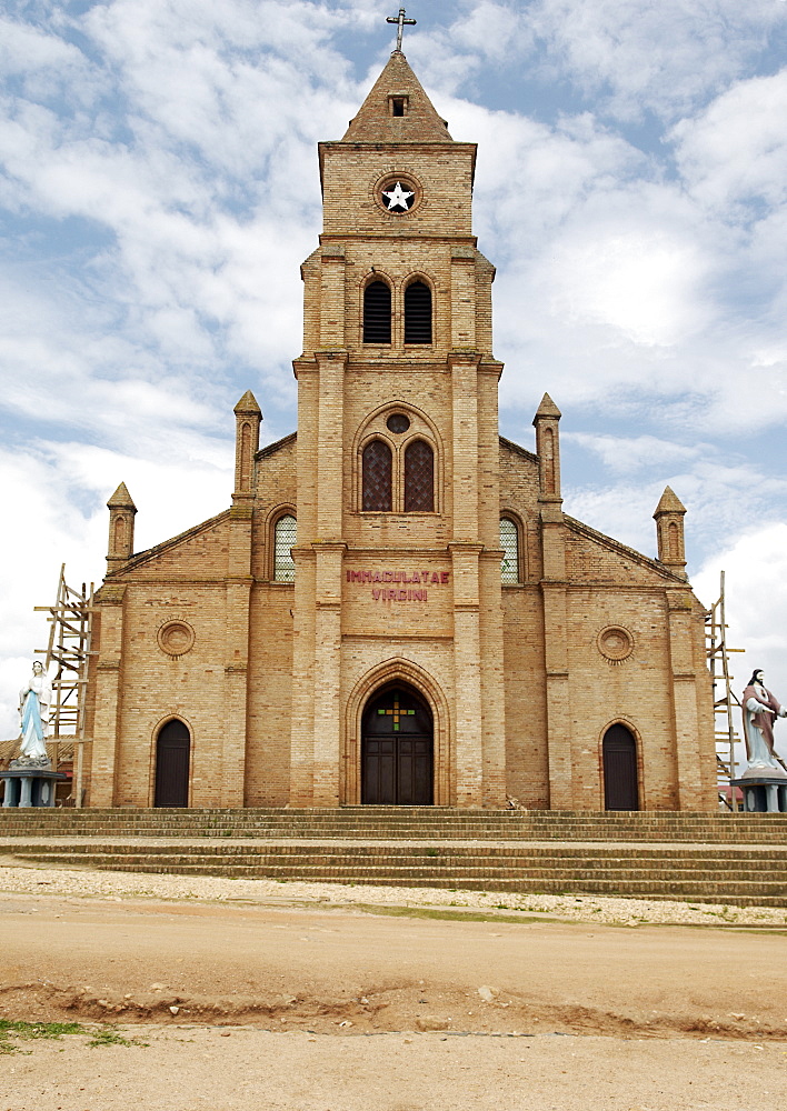 Kabgayi, Rwanda has the oldest Cathedral in the Country (1925), and one of the largest.  Restoration work is underway and scaffolding can be seen supporting either side of the building. Kabgayi, Rwanda, East Africa