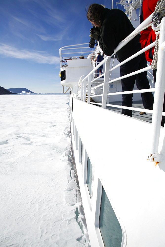 The National Geographic Endeavour breaking through new fast ice around the Antarctic Peninsula. 