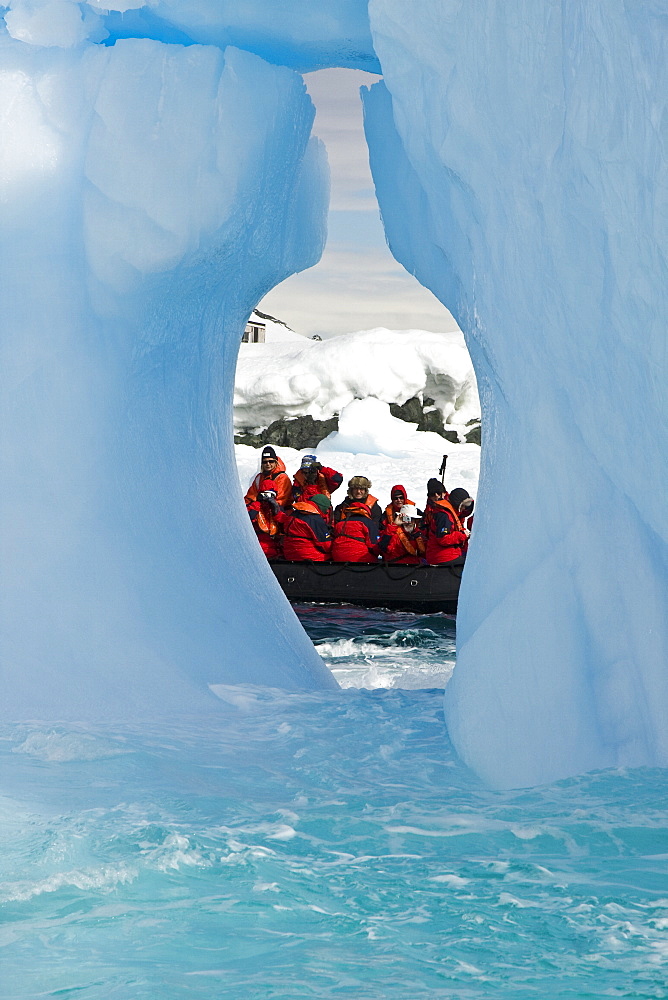 Zodiac and iceberg detail in and around the abandoned British research base "W" in Crystal Sound near the Antarctic Peninsula