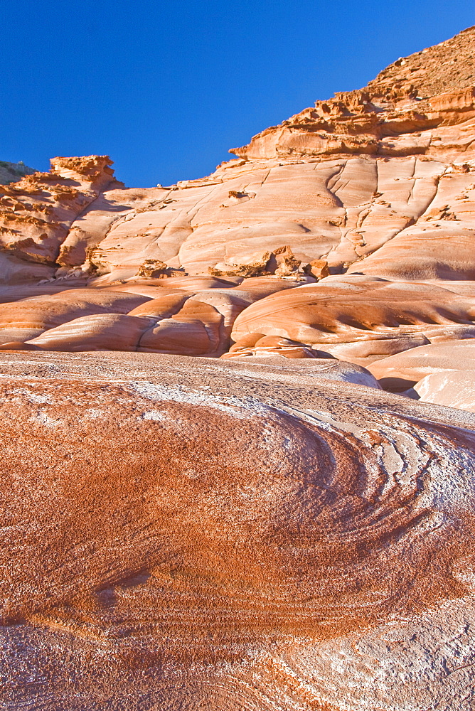 Sunset on the red rock picturesque formations at Los Gatos on the eastern or Gulf of California (Sea of Cortez) side of the Baja Peninsula, Baja California Sur, Mexico.