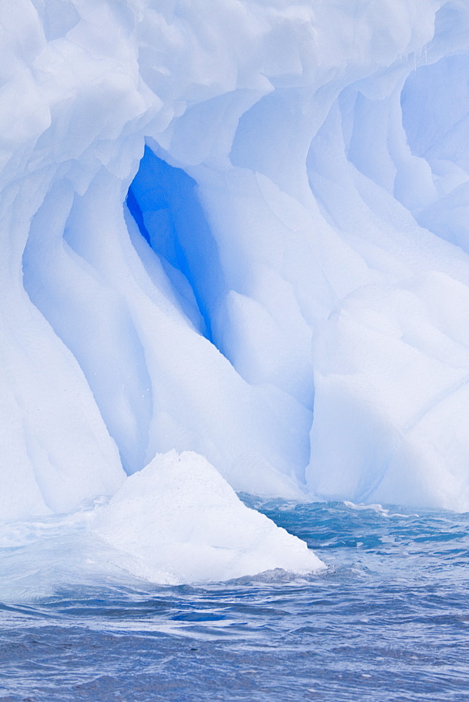 Iceberg detail in and around the Antarctic Peninsula during the summer months. More icebergs are being created as global warming is causing the breakup of major ice shelves and glaciers.